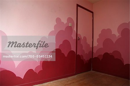 Empty Room with Pink Clouds Painted on Walls