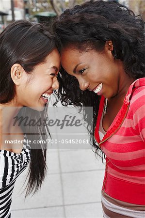 Two Friends Face-to-Face Outdoors