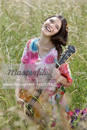 Young woman in corn field