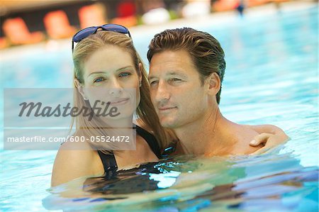 Portrait of Couple in Swimming Pool