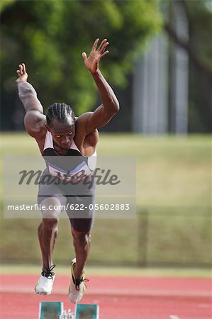 Athlete Sprinting From Starting Blocks