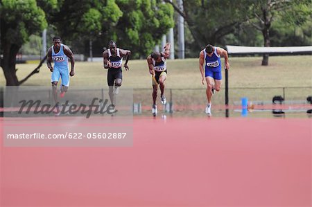 Runners On Race-Track