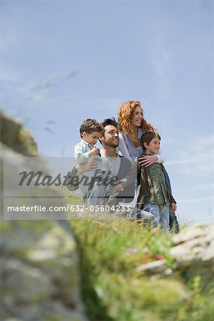 Parents and young boys in nature