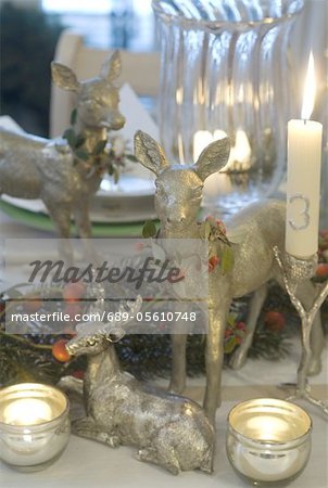 Christmas decoration with deer figurines and candles