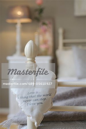 Decorative heart hanging on bed post