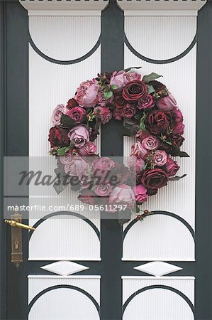 Flower wreath at front door