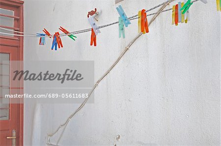 Clothesline with clothes pegs
