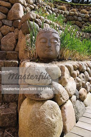 Buddha statue made of stone in garden