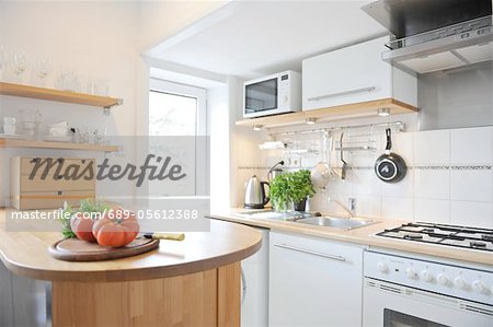 Kitchen with tomatoes on counter