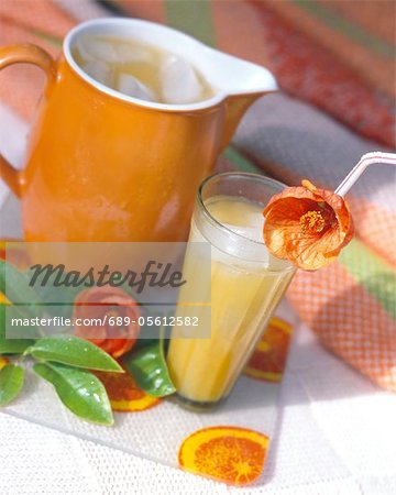 Orange juice with mallow flowers