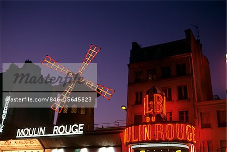 1990s PARIS FRANCE NEON SIGNS AT NIGHT AT THE MOULIN ROUGE