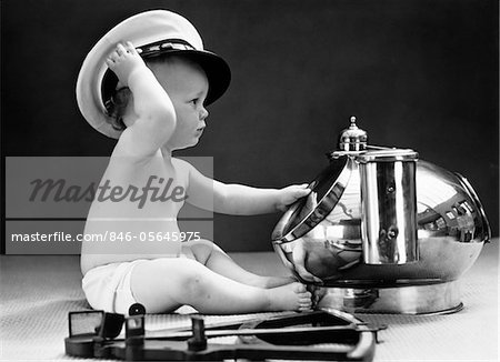 1940s BABY IN DIAPER WITH SHIP CAPTAIN HAT SEXTANT AND NAUTICAL COMPASS