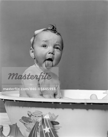 1940s WET BABY IN BATH COVERED WITH SOAP SUDS STICKING OUT TONGUE