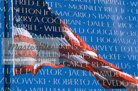 1960s - 1970s - 1980s AMERICAN FLAG REFLECTED IN WALL OF VIETNAM VETERANS MEMORIAL WASHINGTON DC USA