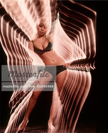 1970s STROBE ZOOM EFFECT SEXY SEDUCTIVE BLOND WOMAN WEARING BLACK BIKINI LINGERIE
