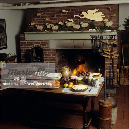1980s KITCHEN INTERIOR WITH FIREPLACE CHRISTMAS DECORATIONS ON MANTLE
