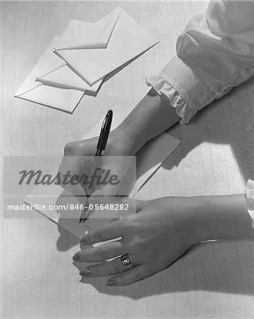 1950s - 1960s WOMAN'S HANDS HOLDING PEN WRITING LETTER ON STATIONERY