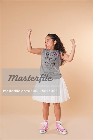 Portrait of Girl Flexing Arms