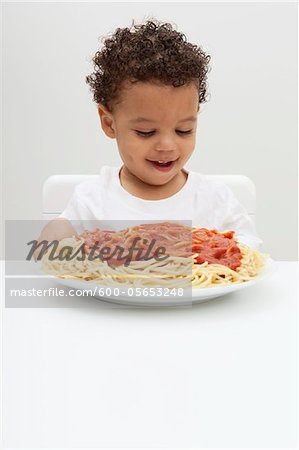 Boy with Plate of Spaghetti