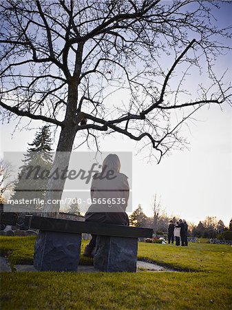 Family Grieving in Cemetery