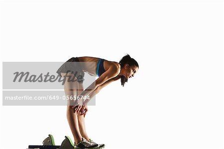 Athlete resting at starting block