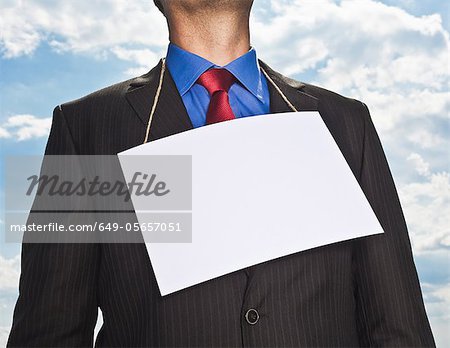 Businessman wearing blank card