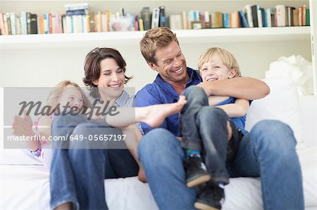 Family relaxing together on couch