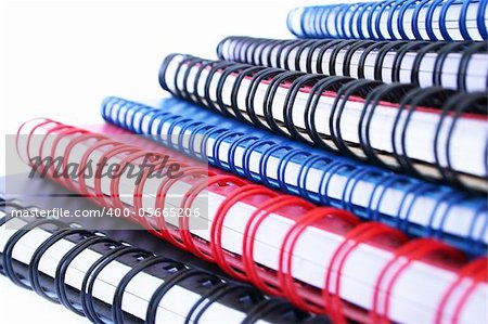 Copybook stack isolated on white background.