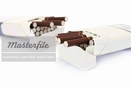 Open full packs cigarettes isolated on white background.