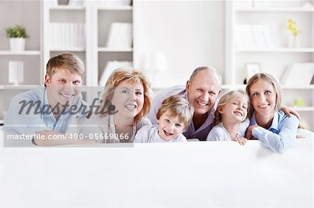Happy family with children at home
