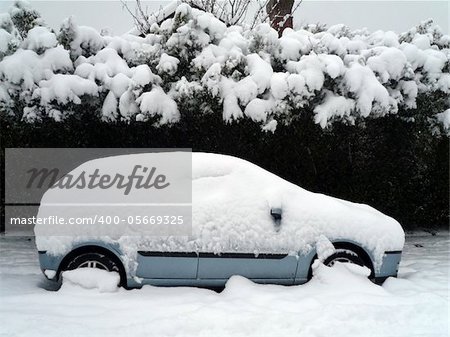 A car stuck in the snow during the winter season