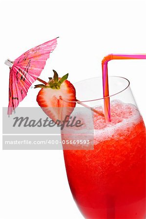 Strawberry daiquiri in glass isolated on white background with umbrella