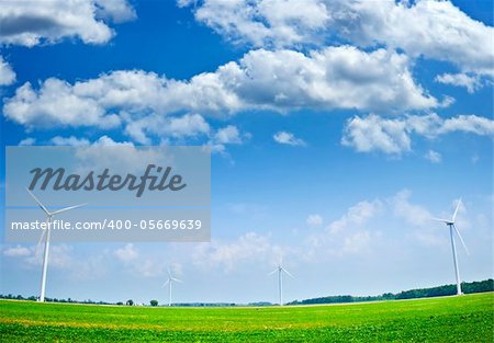 Green alternative clean power wind turbines in field