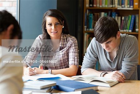 Young adults studying in a library