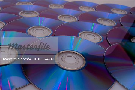 Background of Many Glowing CD Compact Discs