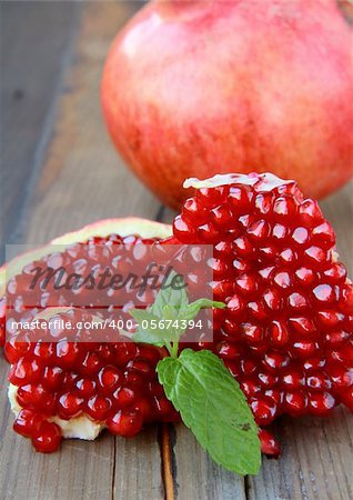 Pomegranates, whole and cut open