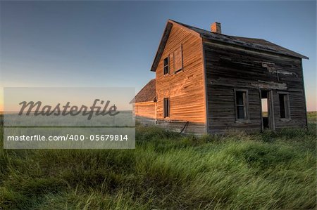 Abandoned Farmhouse Saskatchewan Canada sunset and prairie view