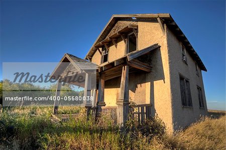 Abandoned Farmhouse Saskatchewan Canada sunset and prairie view