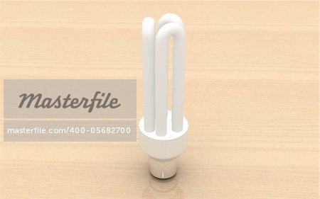 3d Energy saving lamp. Isolated on wooden background