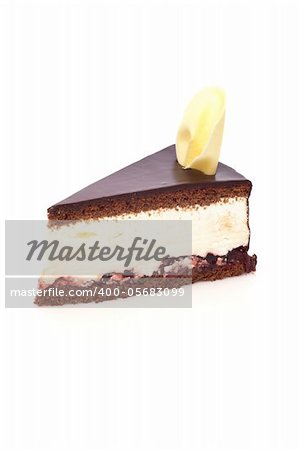 Piece of cake with chocolate glaze isolated on white background