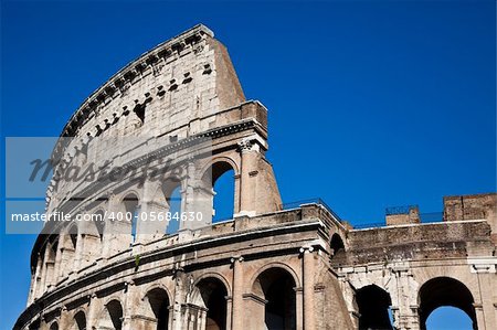 Colosseum in Rome with blue sky, landmark of the city