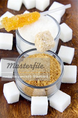 Several types of sugar - refined sugar, brown sugar and granulated sugar