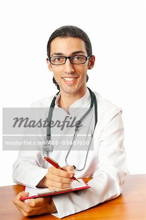 Doctor sitting at the desk on white