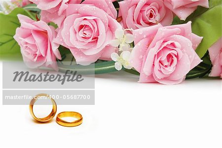Wedding concept with roses and rings