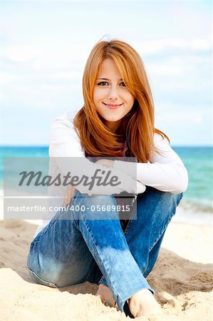 Young beautiful girl at the beach.