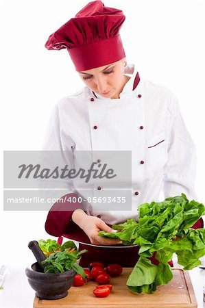 photo of succesfull female restaurant chef on white background