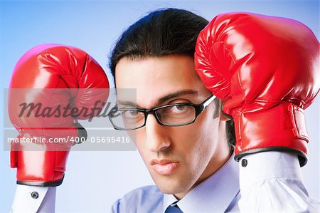 Businessman with boxing gloves