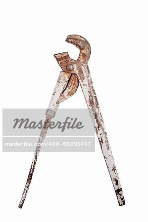 Old rusty adjustable metal key isolated on white background