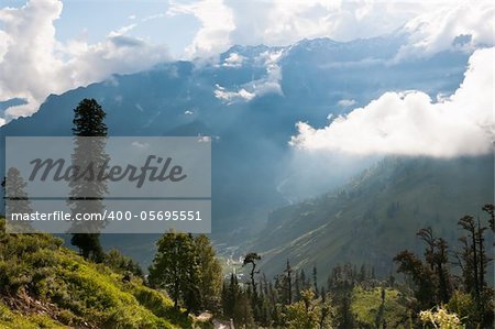 Rays struggle through the fog to valley, North India,  Himalayan