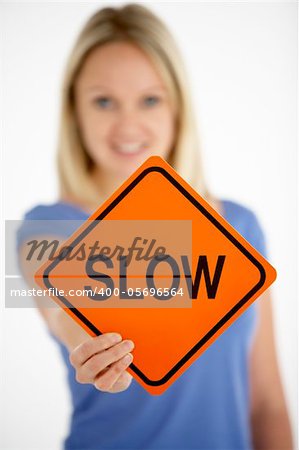 Woman Holding Road Traffic Sign